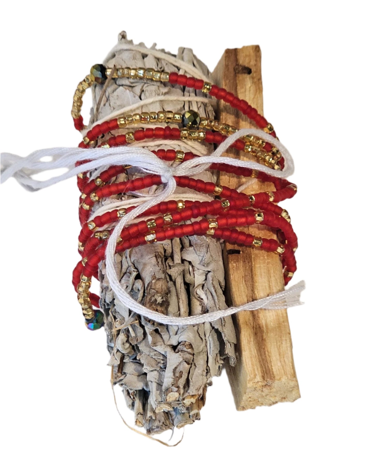 Bundles of red and white ribbons tied together with a stick on a light background