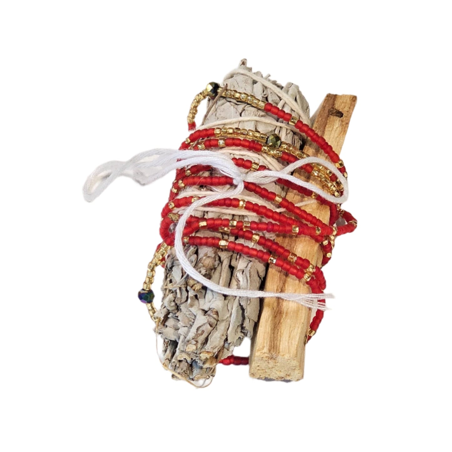 Bundle of sticks with red and white rope on a beige background