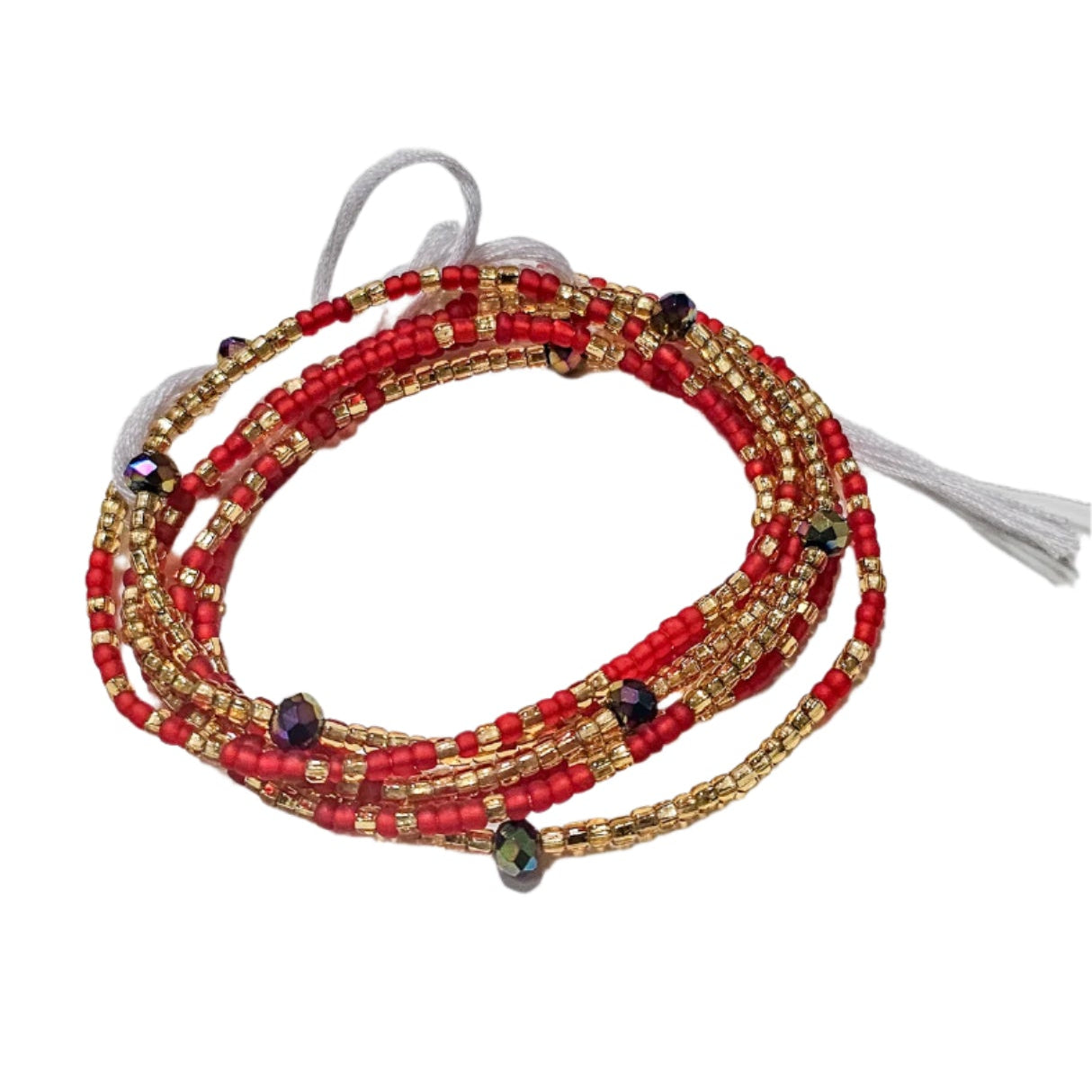 Beaded bracelet with red and gold beads on a white background