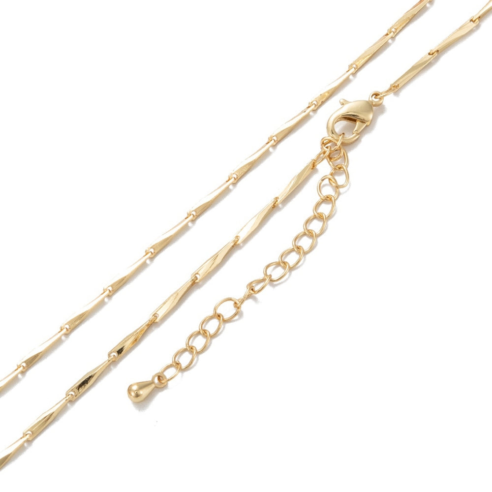 A luxurious 18K gold bar link necklace with a box clasp, displayed on a white background.
