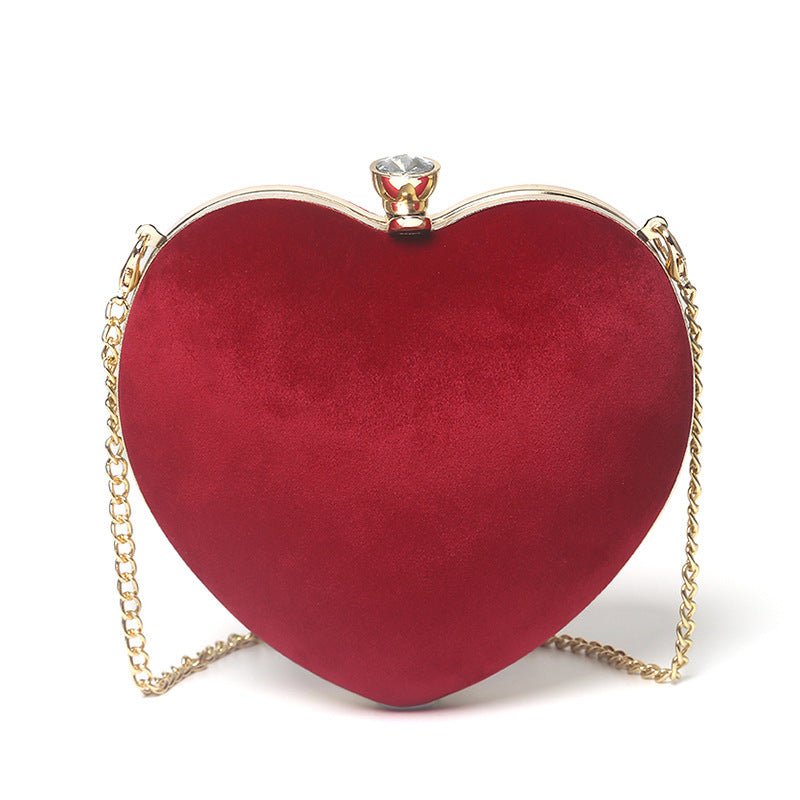 Heart - shaped hand holding chain bagDress