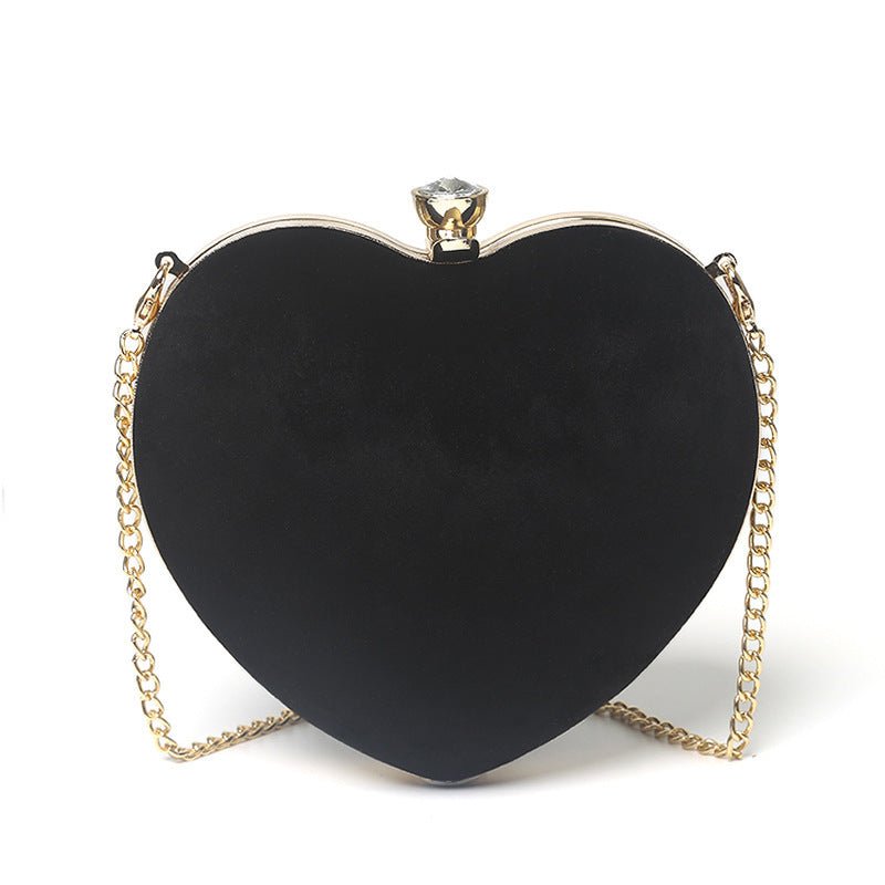 Heart - shaped hand holding chain bagDress